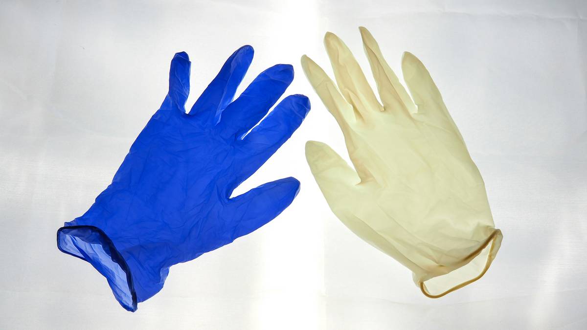 Side-by-side comparison of heat resistant chemical resistant gloves showing material layers and protective features for sustainable home use